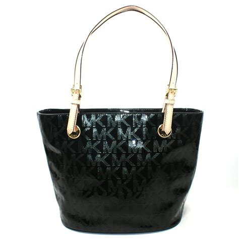 michael kors jet set signature patent leather black tote|Michael Kors carryall.